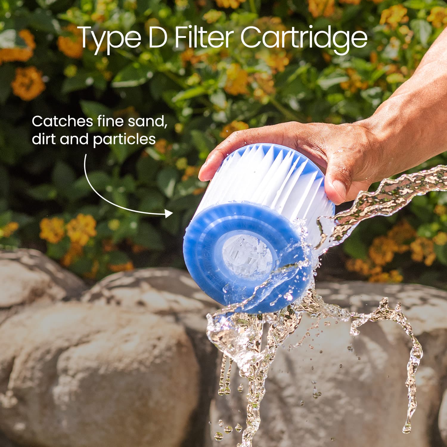 Person holding a blue filter cartridge with water flowing, against a natural background.