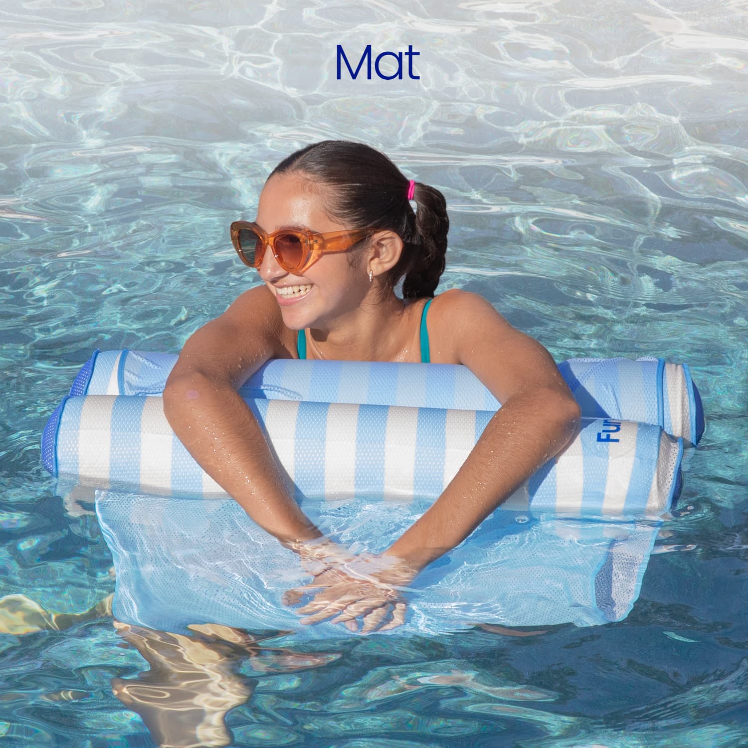 Woman in a pool with a striped pool inflatable