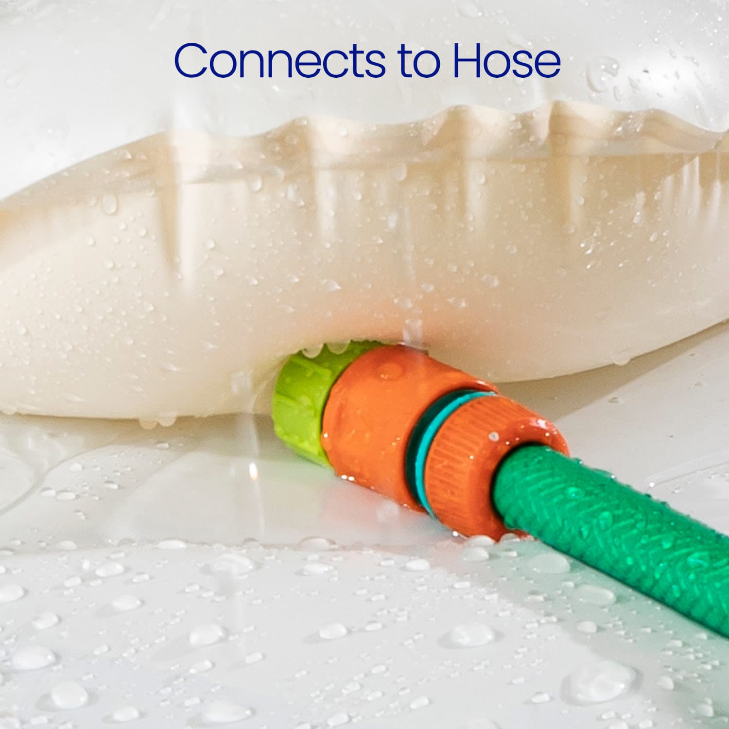 Close-up of a hose connection with text 'Connects to Hose' on a white background.