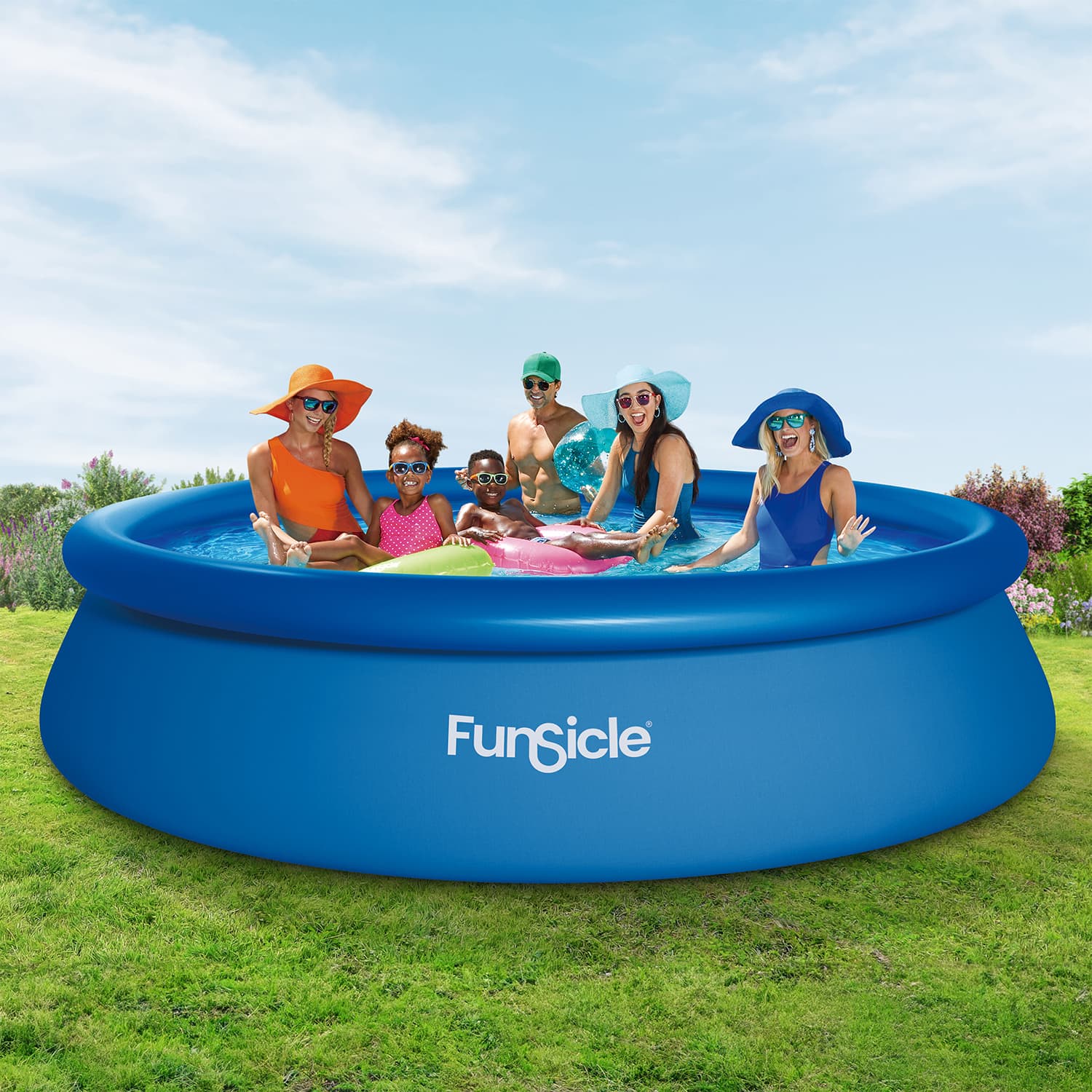 Family enjoying a swim in a blue inflatable pool with 'FunSicle' branding on a grassy area.