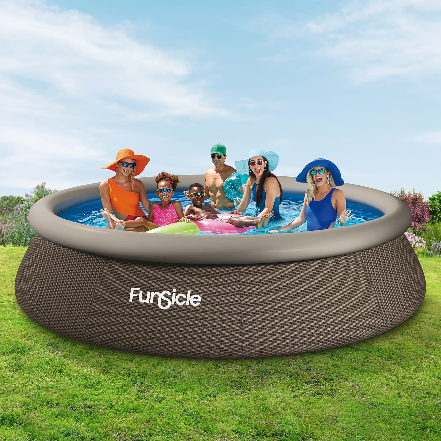 Inflatable pool with 'Funsicle' branding, people enjoying a swim on a grassy area with a clear sky.