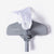 Gray vacuum attachment with a white filter on a white background
