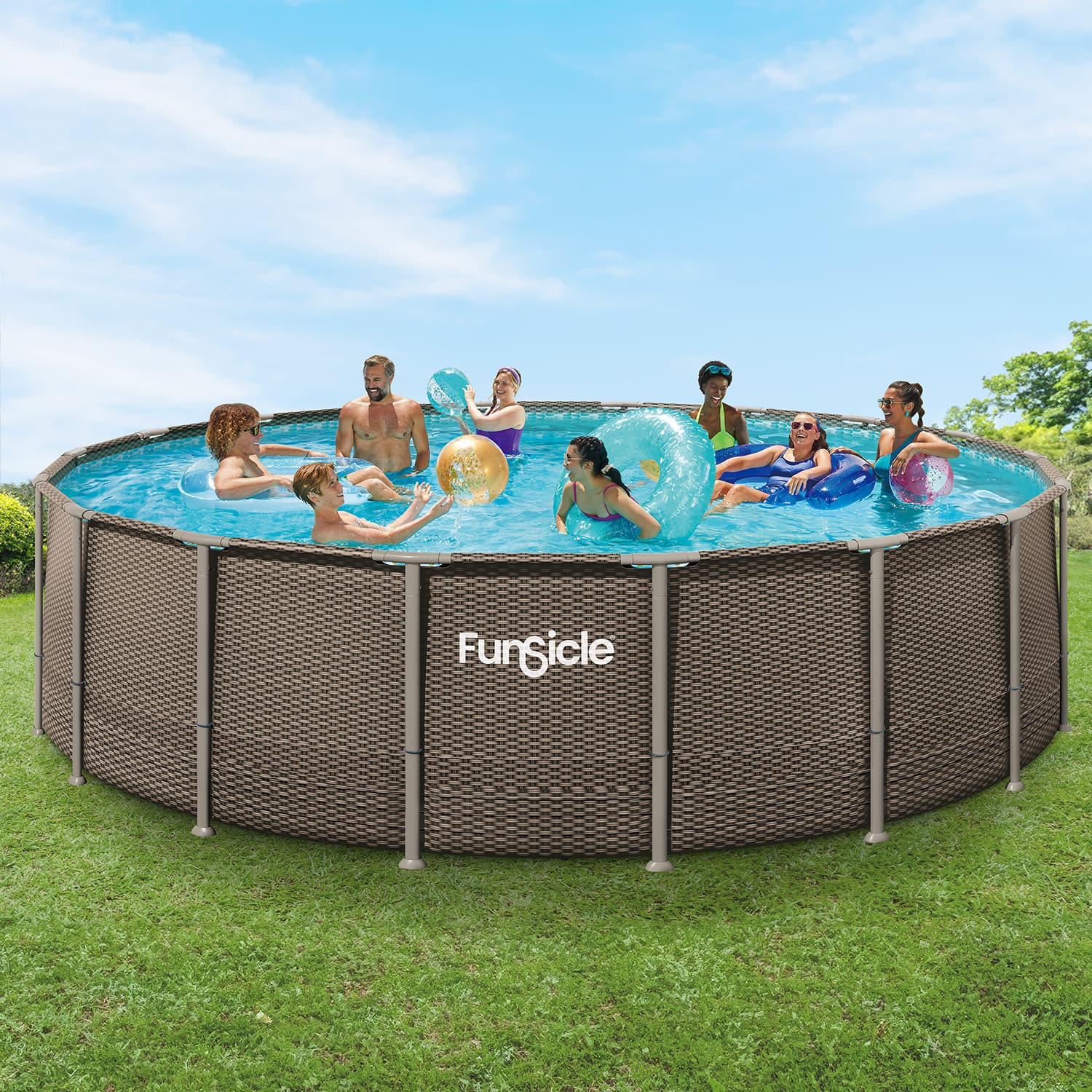 People playing in a round above-ground pool with 'Funsicle' branding on a grassy area.